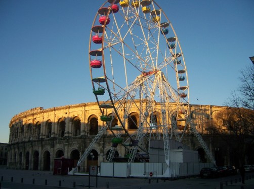 The day I met France. I arrived at Nimes on an overnight bus and watched the sunrise at the colosseum.